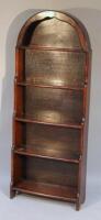 A mid-20thC oak stained freestanding bookcase