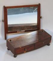 A 19thC mahogany bow fronted table mirror