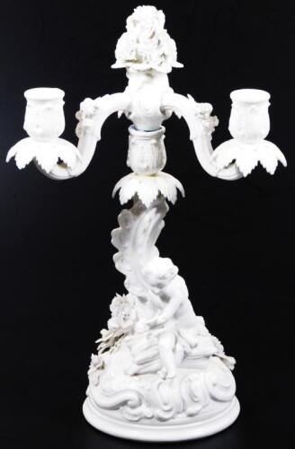 A Berlin porcelain and Parian candelabrum