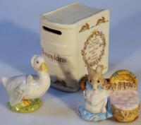 A Royal Doulton Bunnykins money box