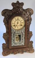 An early 20thC Ansonia gingerbread clock