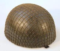 A British paratrooper's steel helmet.