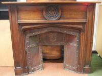 An early 20thC oak fire surround