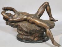 A bronzed figure