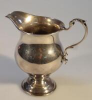 A George V silver cream jug