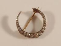 A Victorian crescent brooch