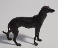 A bronze patinated cast figure of a greyhound