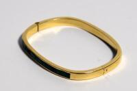 A rounded rectangular bangle