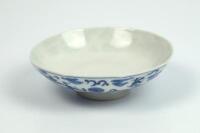 An early 20thC Chinese blue and white shallow pedestal bowl