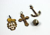 Three pendants and a charm