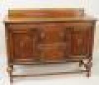 A 1930's oak sideboard