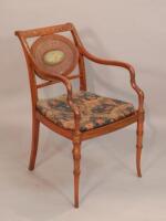 A late Victorian neo-classical revival open satinwood armchair