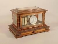 A late 19th/early 20thC carved oak barograph