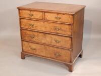 A George I style crossbanded walnut chest