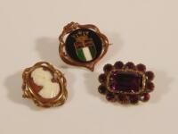 Three brooches