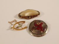 Three brooches