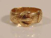 A 9ct gold buckle ring