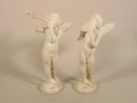 Two Continental ceramic cherubs