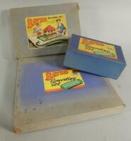 Three Bayko building sets