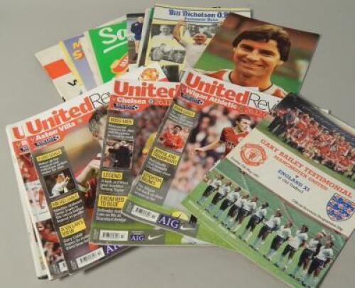 A large quantity of football programmes