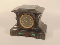 A late 19thC French black marble and malachite inlaid mantel clock