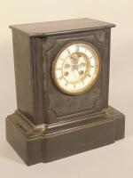 A late 19thC French black marble mantel clock