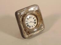 An Edwardian silver mounted travelling watch case