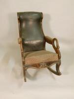 A Victorian mahogany show frame rocking chair