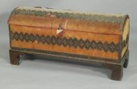 An Eastern velvet and pressed metal sword chest