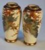 A pair of Japanese satsuma earthenware vases