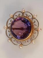 An amethyst and seed pearl brooch