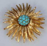 An Art Deco design sun burst brooch