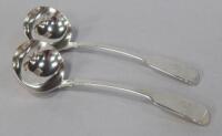 A pair of early Victorian silver Fiddle pattern sauce ladles