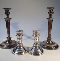 A pair of silver plated candlesticks