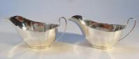 A pair of George VI silver sauce boats