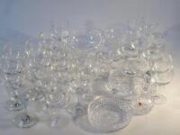 Various crystal and glass drinking glasses