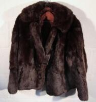 A ladies faux fur coat