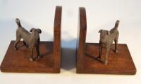 A pair of 1920's oak and spelter book ends