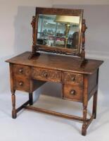 A Jacobean style oak desk