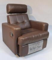 A brown leather reclining armchair