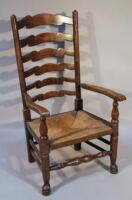 A 19thC elm rush seated chair