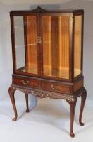 A Chippendale design display cabinet