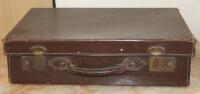 An early 20thC pressed leather travel case