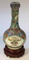 A Chinese porcelain famille vert bottle vase