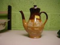 A Royal Doulton stoneware coffee pot of baluster form