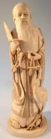 A Japanese carved ivory okimino figure