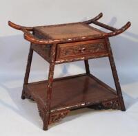 A Japanese rosewood side table