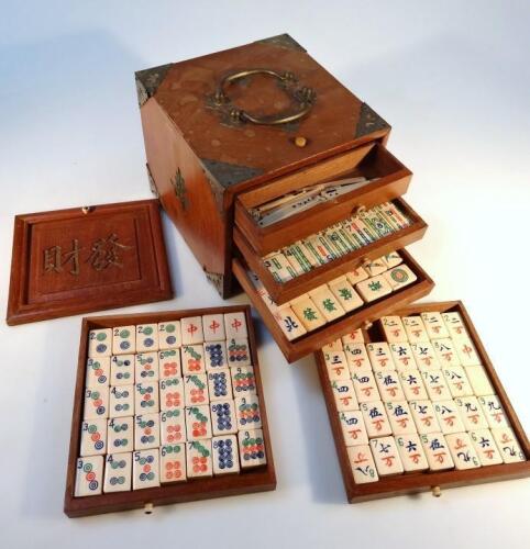 An early 20thC hardwood Mahjong set