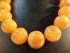 An amber bead necklace - 2