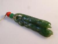 A green jade pendant